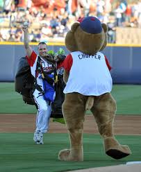 Staff Member of No Limits Skydiving Bring The Game Ball Into the Baseball Game